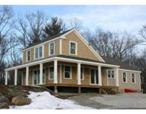 181 Prospect Hill Road Harvard, MA 01451 - Photo 1 of 1 a front view of a house with yard and trees in the background