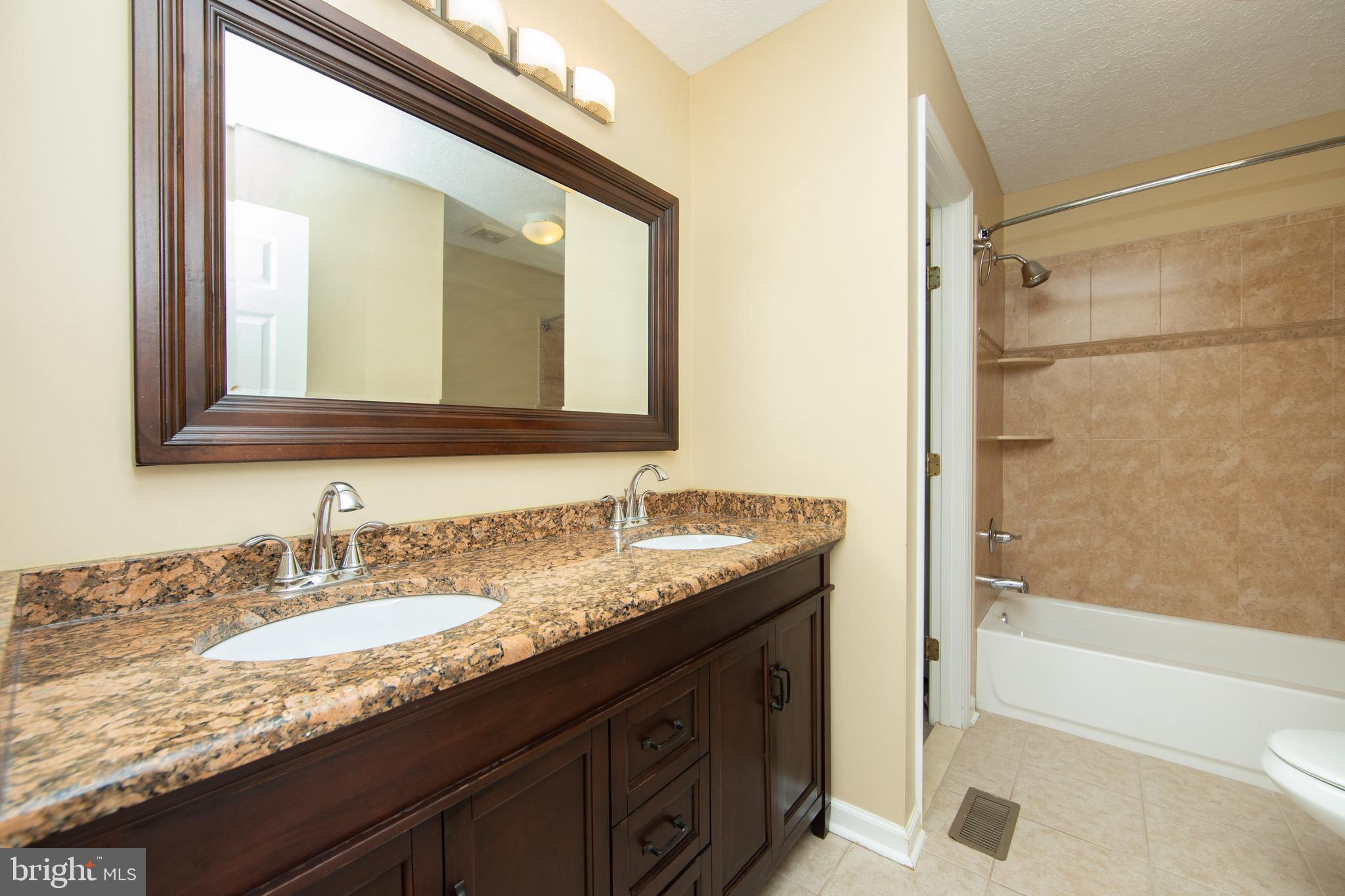 105 Juliet Road Morrisville, PA 19067 - Photo 37 of 50 Upstairs Hall bath with dual sinks
