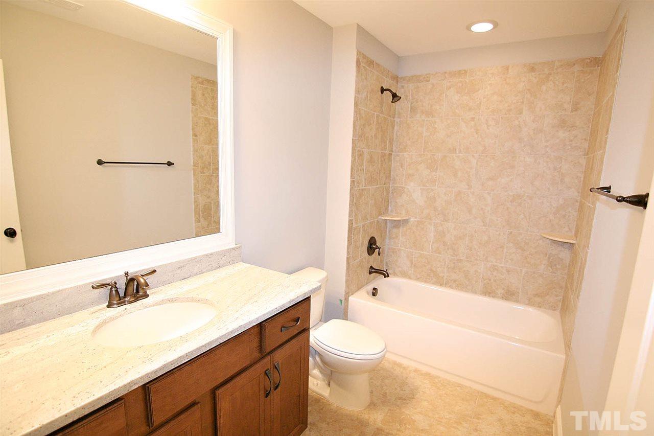 1211 Kingston Ridge Road Cary, NC 27511 - Photo 22 of 25 This picture is from a past build. Quality of features are the same, but paint colors, tile choices, cabinet selections may vary.