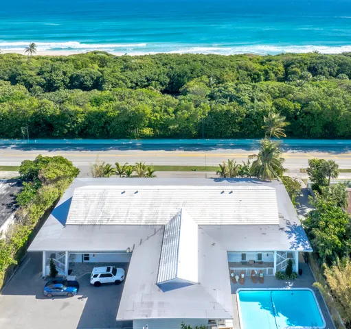 a view of swimming pool with seating space