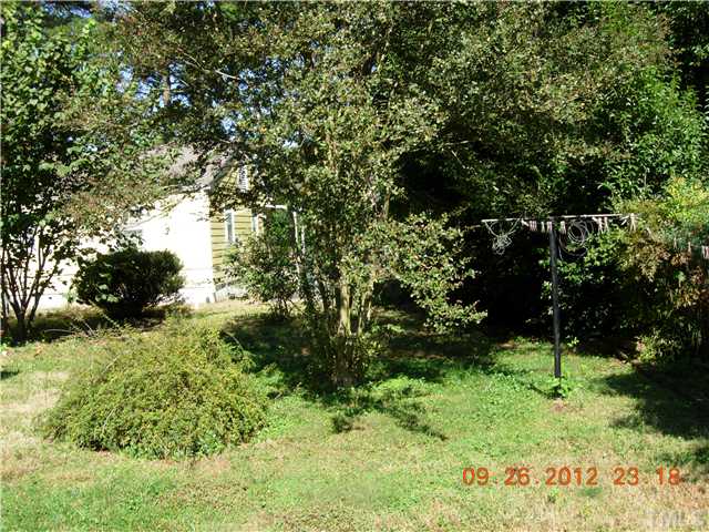 309 Hudson Street Raleigh, NC 27608 - Photo 16 of 17 a view of a garden