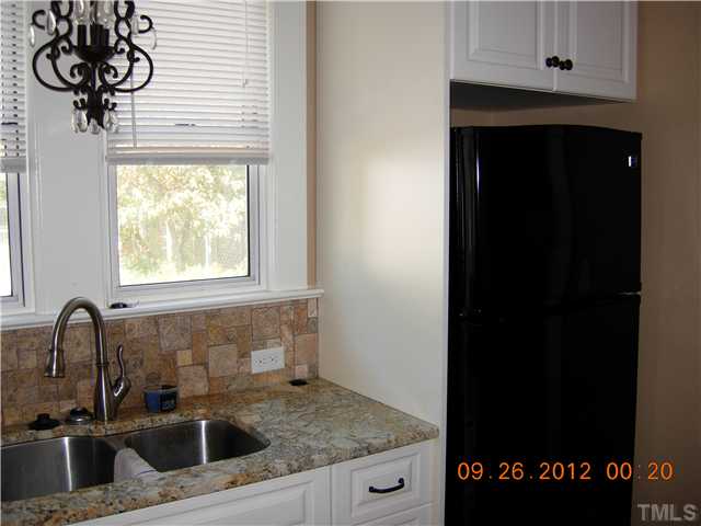 309 Hudson Street Raleigh, NC 27608 - Photo 5 of 17 a view of a sink and a window