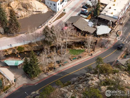 an aerial view of residential house and green space