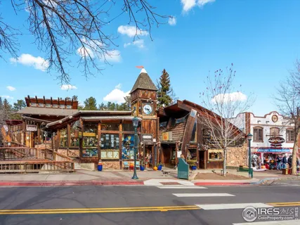 a view of a street with cars