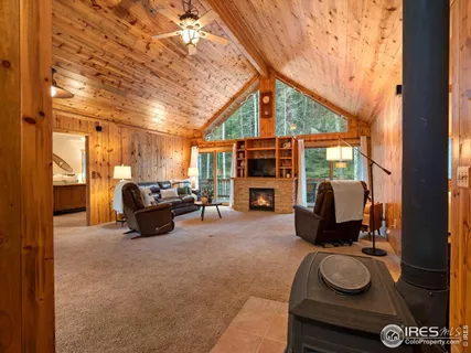 a room with furniture and a mirror