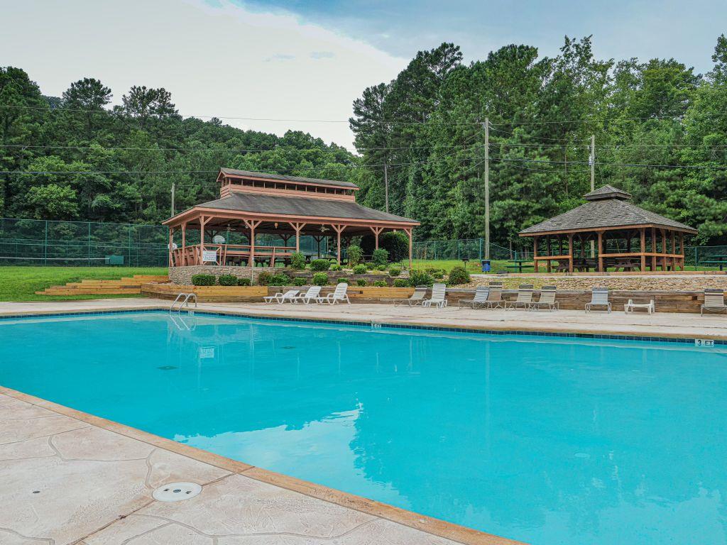 1374 Northeast Foxhound Ranger, GA 30734 - Photo 42 of 45 a swimming pool view with a garden space