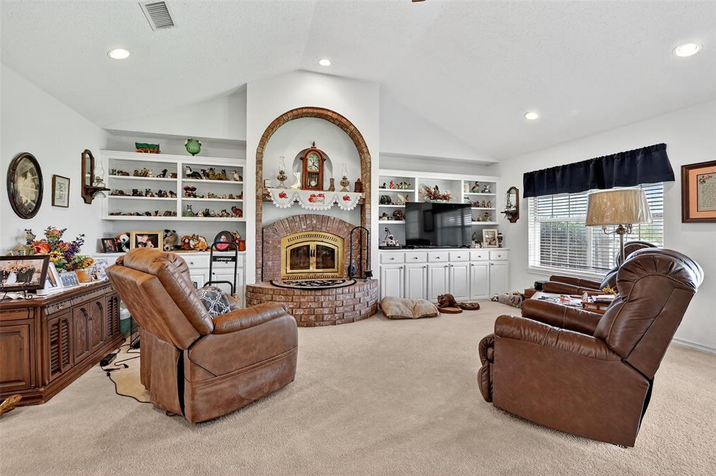 929 County Line Church Road Whitesboro, TX 76273 - Photo 13 of 38 a living room with furniture and a fireplace