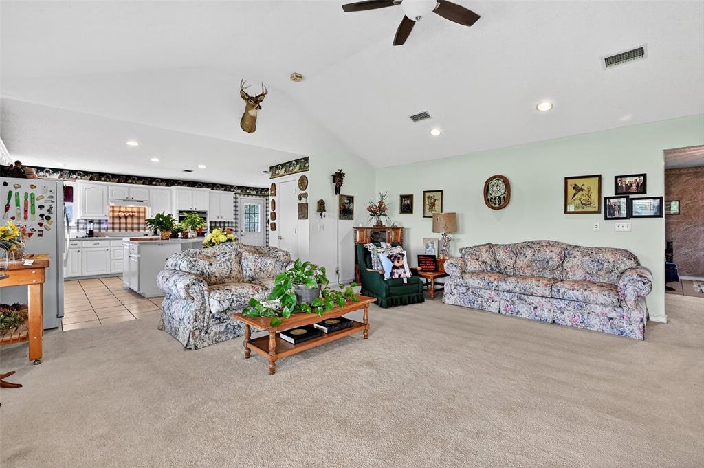 929 County Line Church Road Whitesboro, TX 76273 - Photo 15 of 38 a living room with furniture and kitchen view