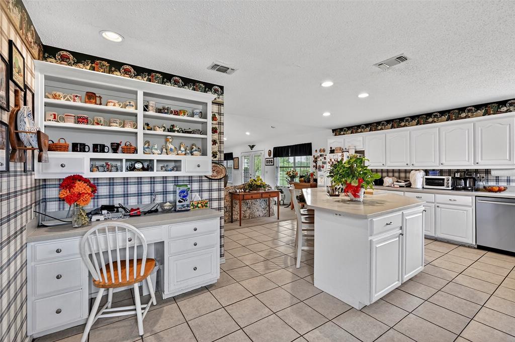 929 County Line Church Road Whitesboro, TX 76273 - Photo 18 of 38 a kitchen with stainless steel appliances granite countertop a sink and cabinets