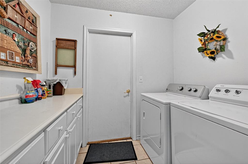 929 County Line Church Road Whitesboro, TX 76273 - Photo 31 of 38 a utility room with dryer and washer
