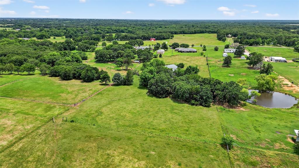 929 County Line Church Road Whitesboro, TX 76273 - Photo 37 of 38 a view of a garden with houses