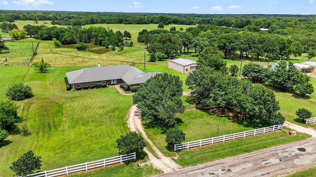 929 County Line Church Road Whitesboro, TX 76273 - Photo 38 of 38 an aerial view of a golf course with parking space