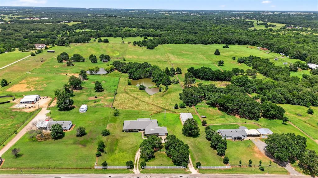 929 County Line Church Road Whitesboro, TX 76273 - Photo 9 of 38 an aerial view of residential houses with outdoor space and trees
