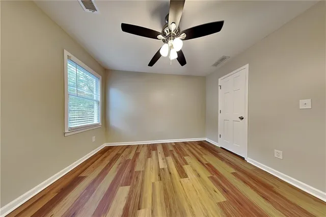 a view of room with ceiling fan