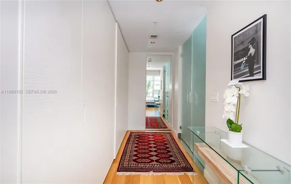 a bath room with a rug and a rug