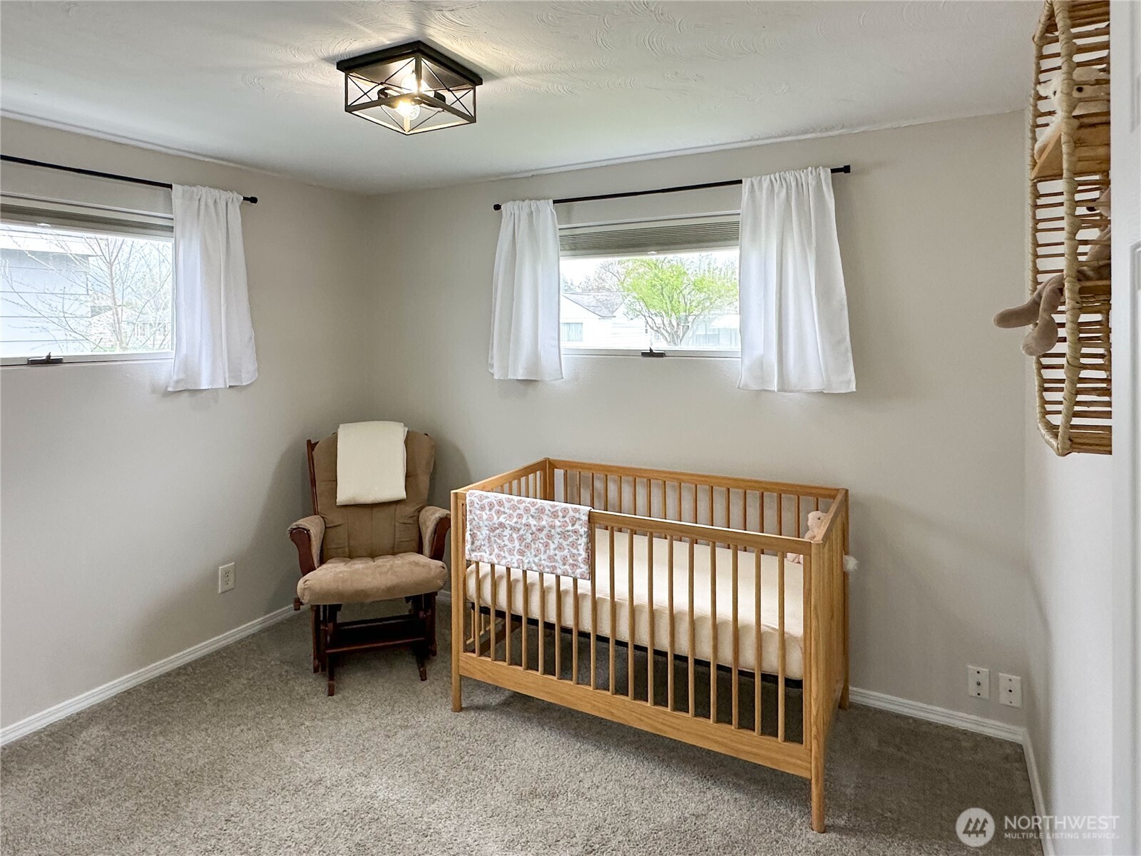611 East Joseph Avenue Spokane, WA 99208 - Photo 13 of 29 a bedroom with furniture and a window