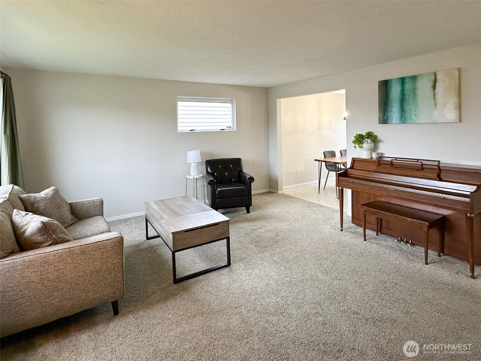 611 East Joseph Avenue Spokane, WA 99208 - Photo 3 of 29 a living room with furniture and a piano