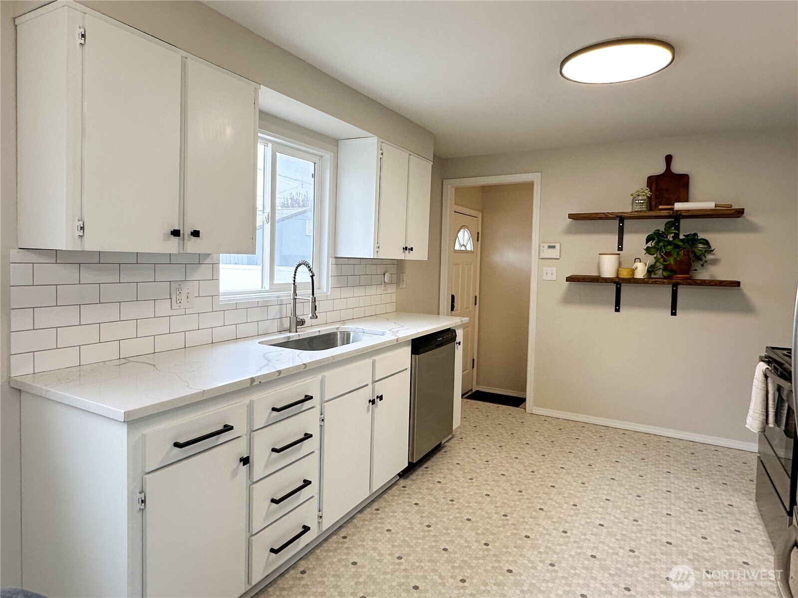 611 East Joseph Avenue Spokane, WA 99208 - Photo 8 of 29 a kitchen with sink cabinets and appliances