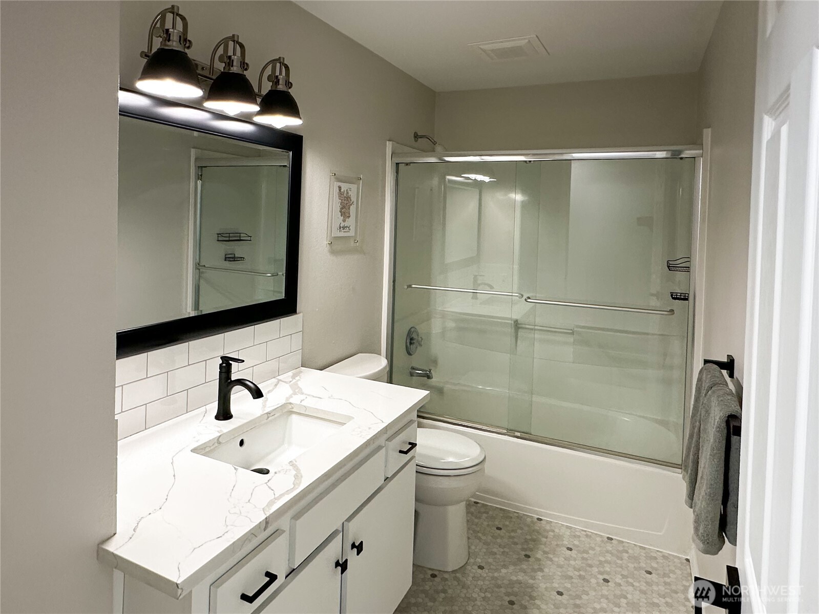 611 East Joseph Avenue Spokane, WA 99208 - Photo 10 of 29 a bathroom with a sink toilet and shower