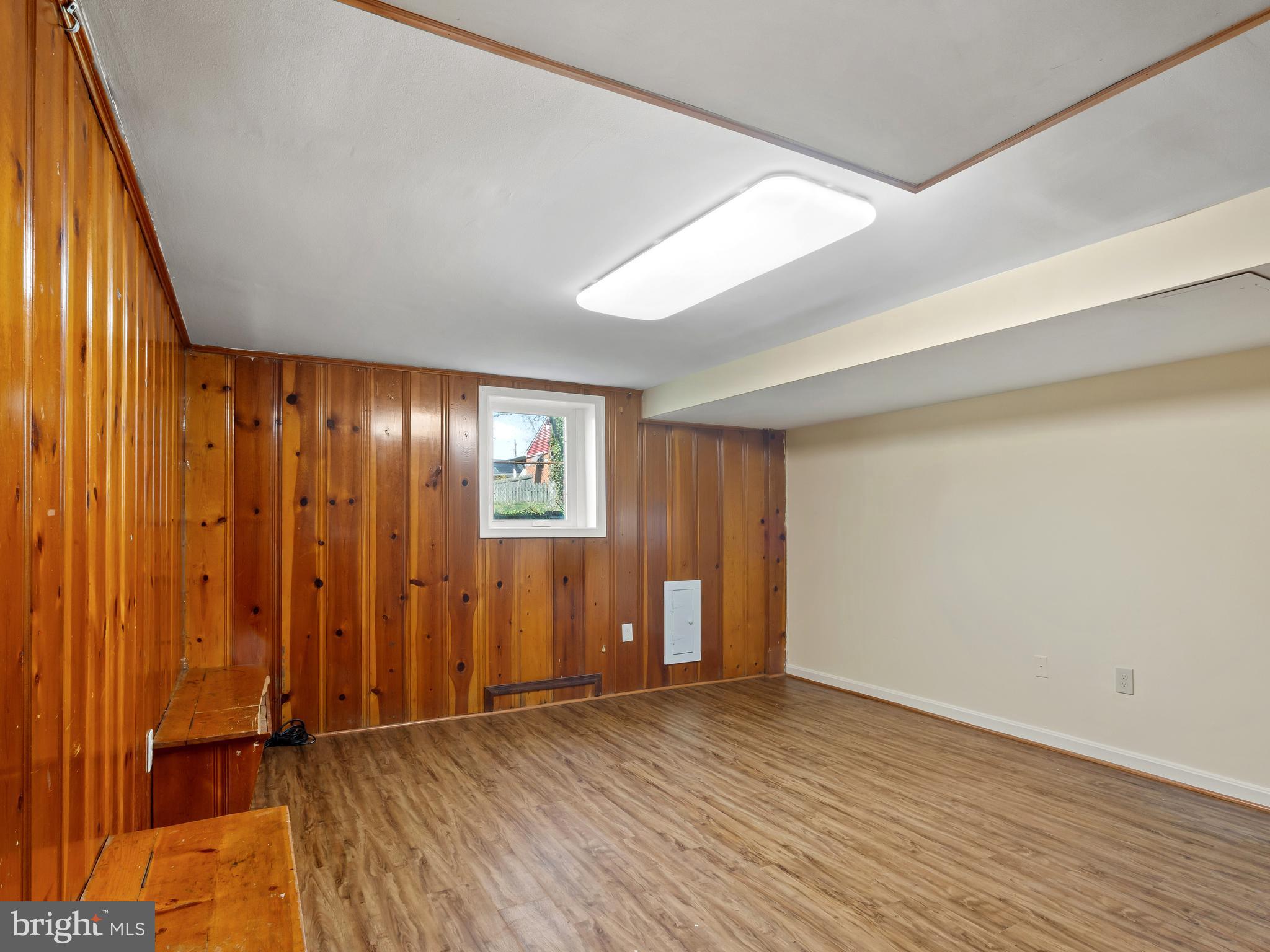 3405 Fredale Street Silver Spring, MD 20906 - Photo 19 of 34 an empty room with wooden floor and windows