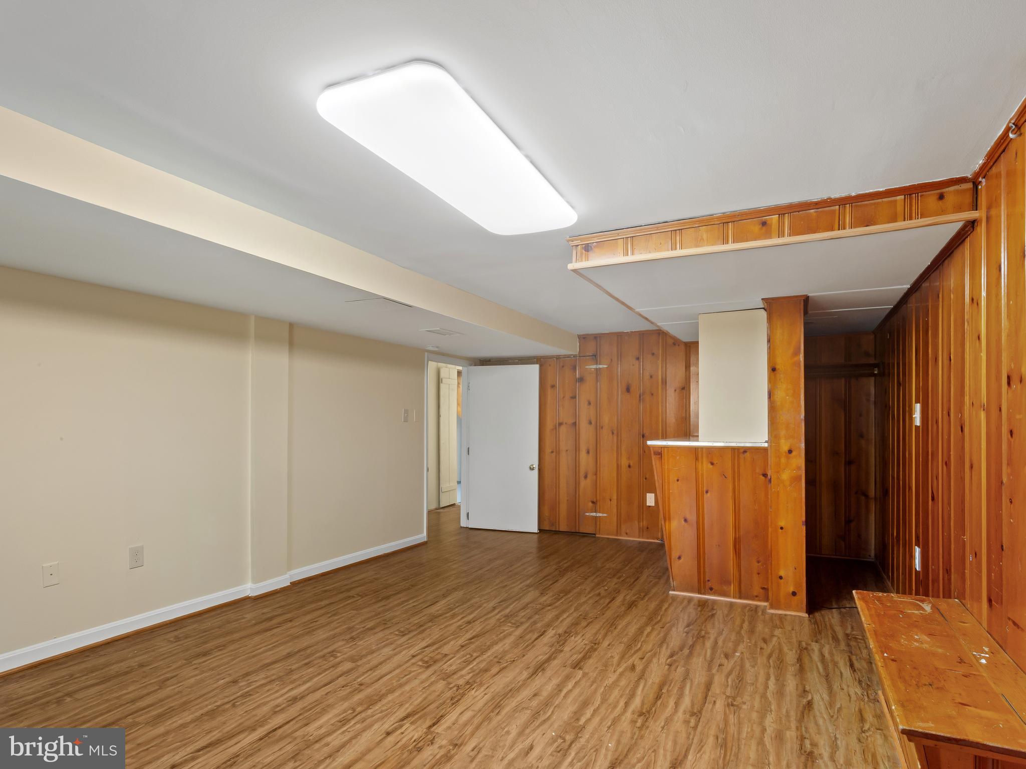 3405 Fredale Street Silver Spring, MD 20906 - Photo 20 of 34 an empty room with wooden floor and windows