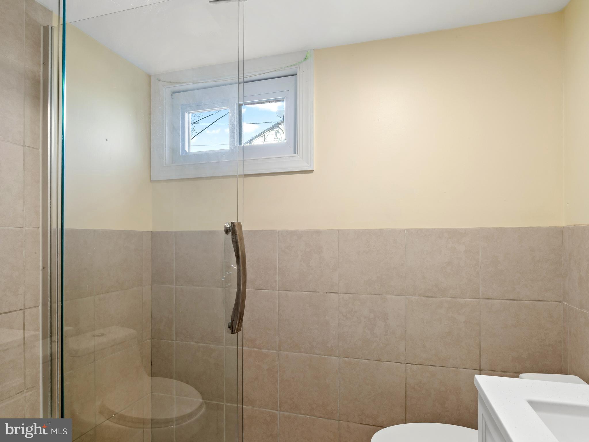 3405 Fredale Street Silver Spring, MD 20906 - Photo 25 of 34 a bathroom with a toilet and shower