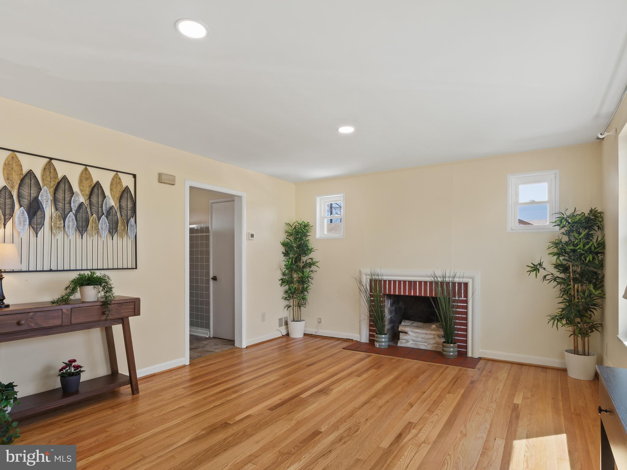 3405 Fredale Street Silver Spring, MD 20906 - Photo 4 of 34 a view of empty room with furniture and a fireplace