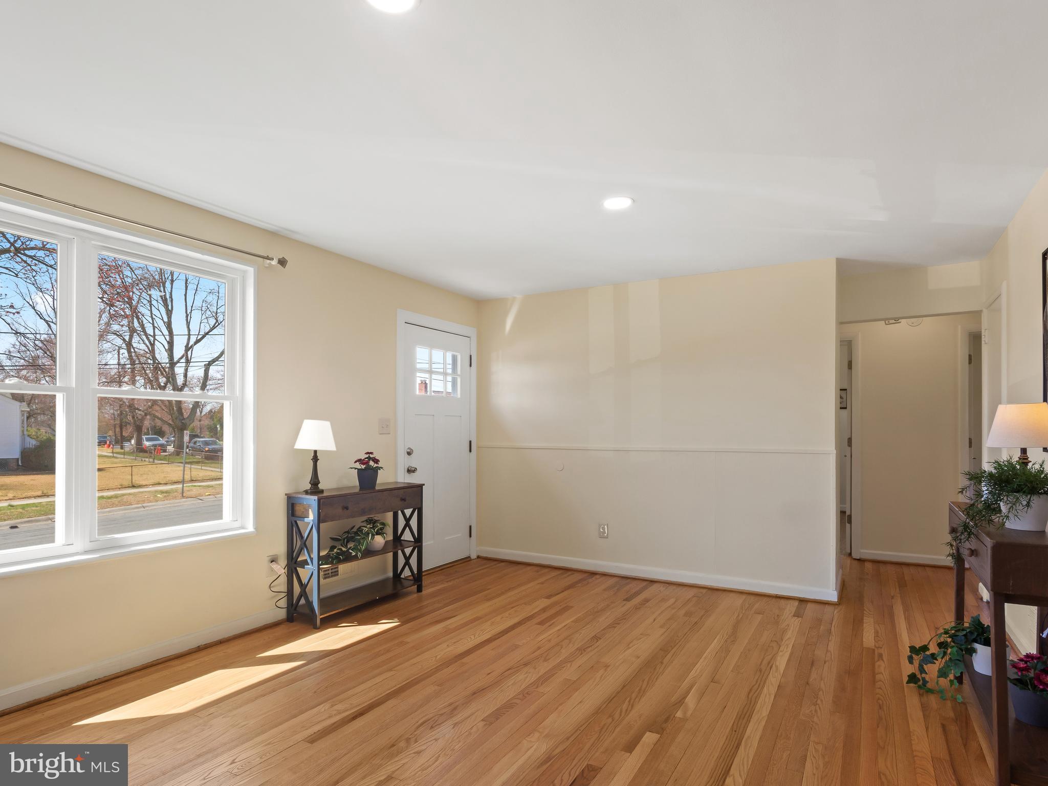 3405 Fredale Street Silver Spring, MD 20906 - Photo 6 of 34 a view of a livingroom with furniture and wooden floor