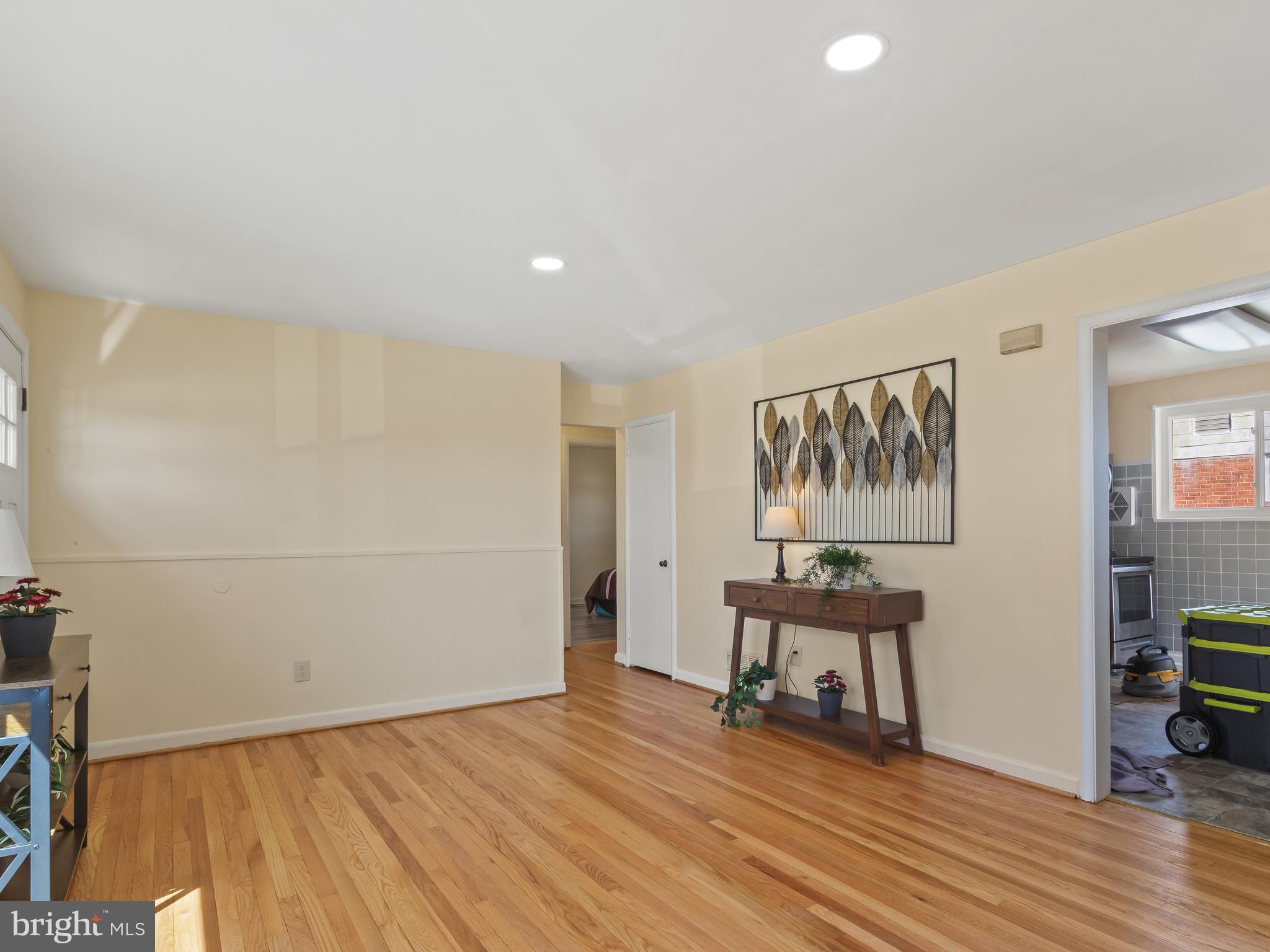 3405 Fredale Street Silver Spring, MD 20906 - Photo 7 of 34 a view of a room with wooden floor and bench