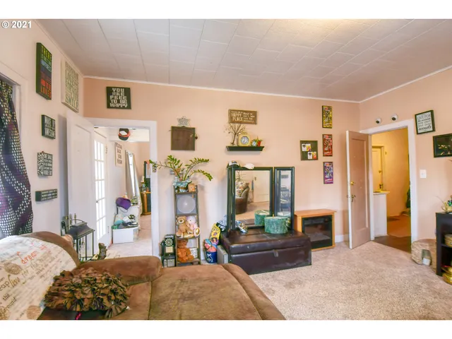 a bedroom with furniture and a fireplace