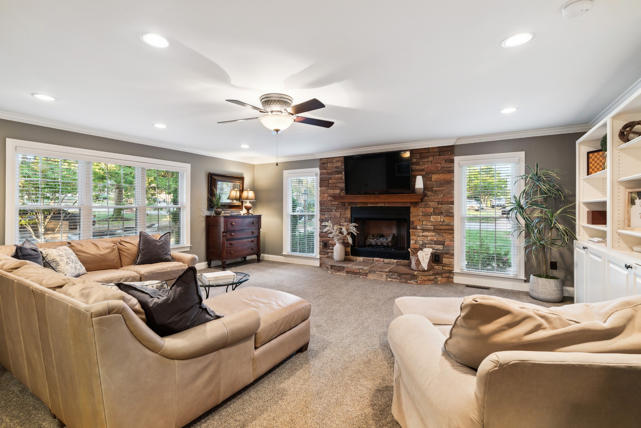 5224 Rustic Way Old Hickory, TN 37138 - Photo 15 of 56 a living room with furniture a fireplace and a flat screen tv