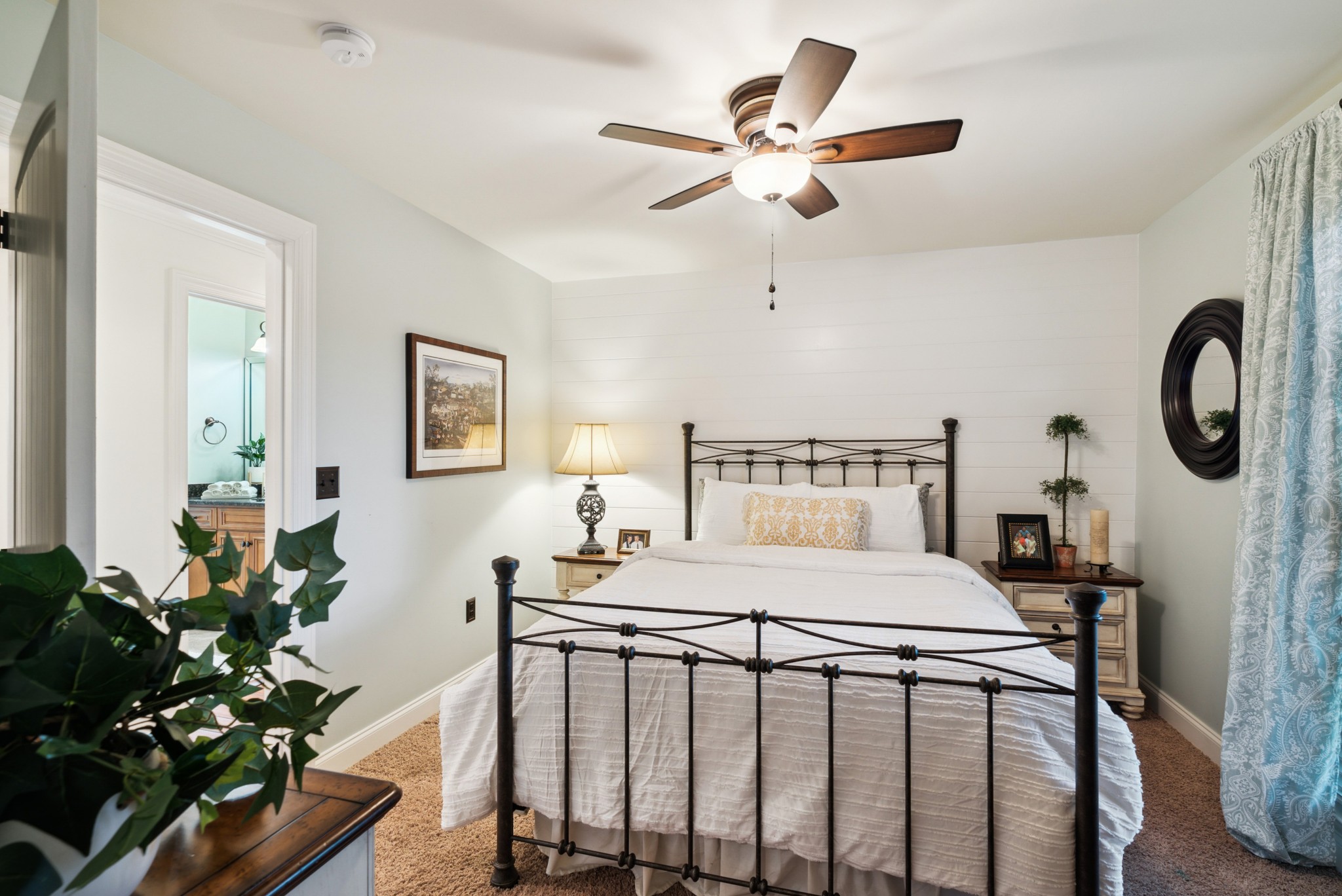 5224 Rustic Way Old Hickory, TN 37138 - Photo 20 of 56 a bedroom with a bed a chandelier and dresser