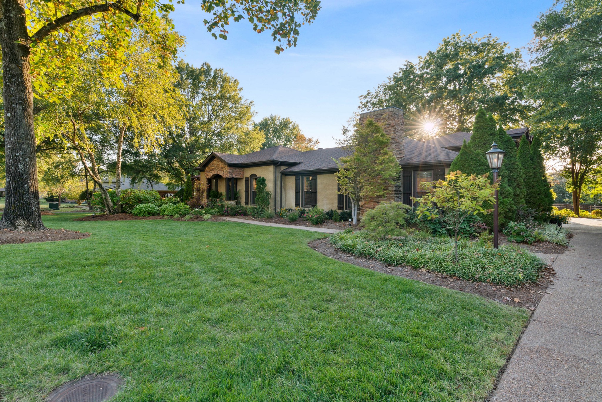 5224 Rustic Way Old Hickory, TN 37138 - Photo 3 of 56 a front view of a house with yard and green space