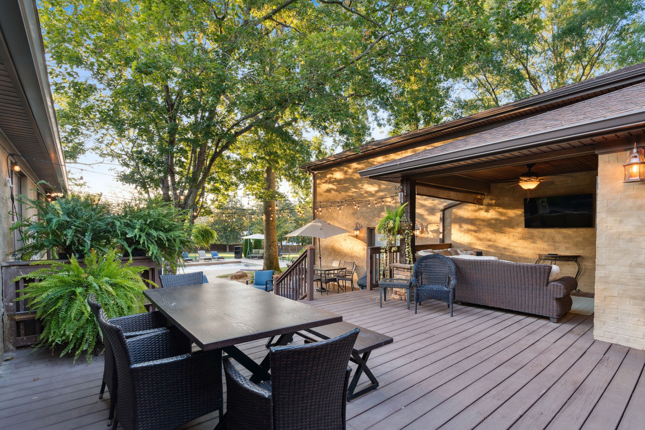 5224 Rustic Way Old Hickory, TN 37138 - Photo 37 of 56 a view of a patio with table and chairs with wooden floor and plants