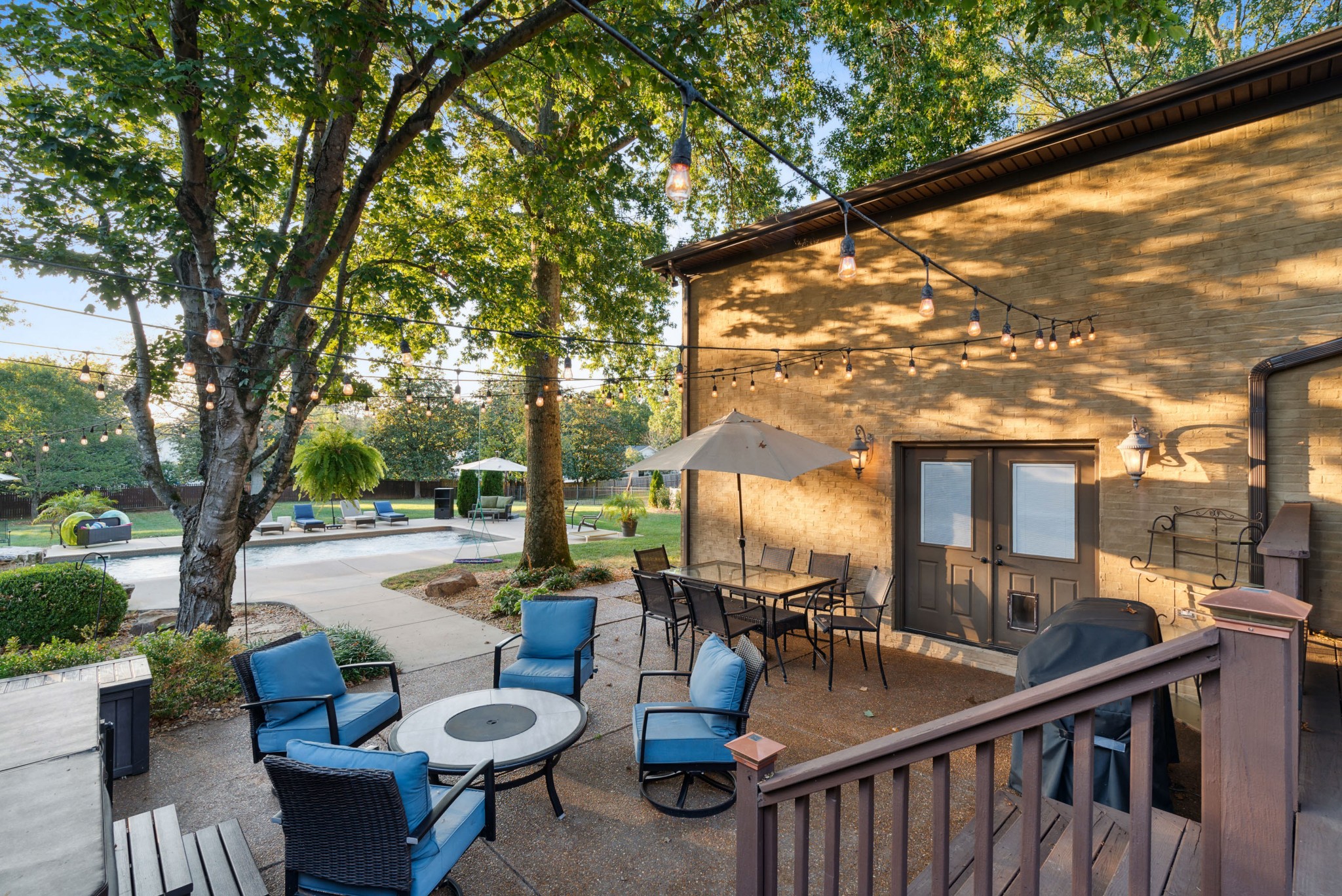 5224 Rustic Way Old Hickory, TN 37138 - Photo 38 of 56 a view of a patio with couches table and chairs and potted plants