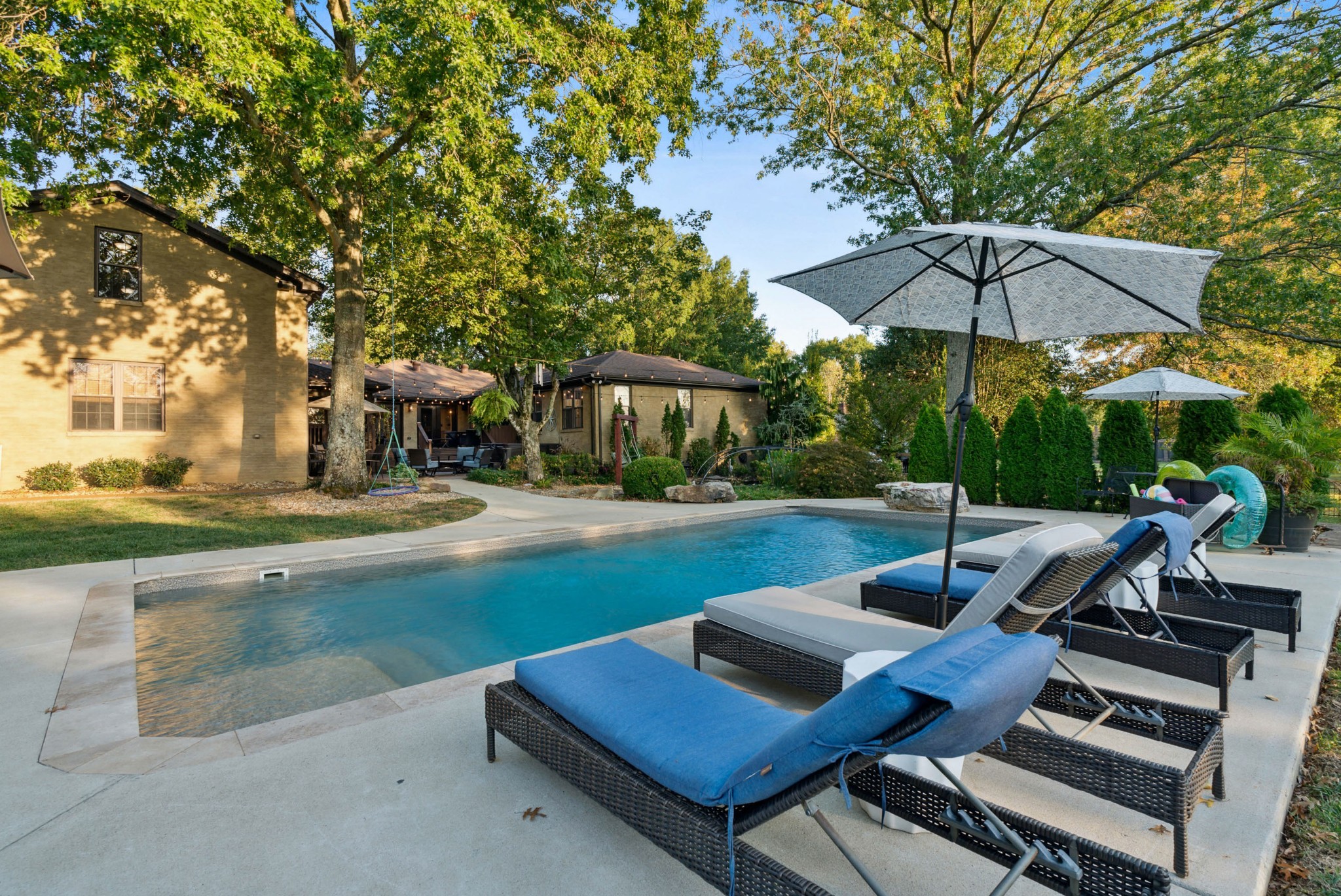 5224 Rustic Way Old Hickory, TN 37138 - Photo 45 of 56 a view of a house with backyard sitting area and swimming pool