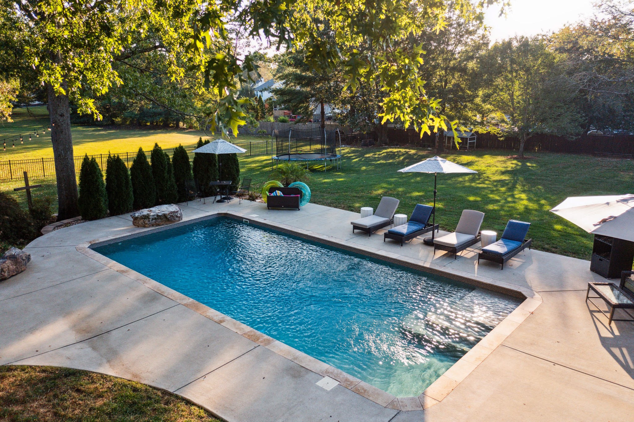 5224 Rustic Way Old Hickory, TN 37138 - Photo 56 of 56 swimming pool with large trees and couple of relaxing chair