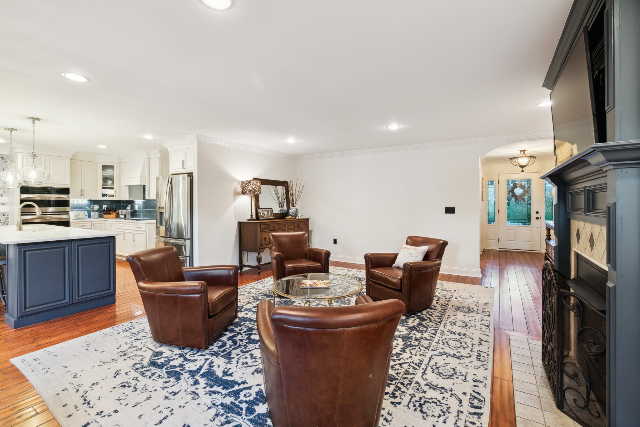 5224 Rustic Way Old Hickory, TN 37138 - Photo 10 of 56 a living room with furniture a flat screen tv and a fireplace