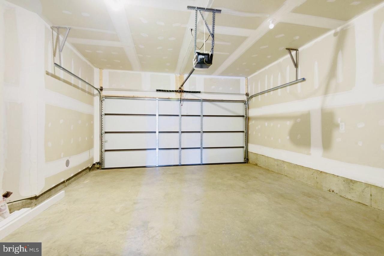 325 Ensemble Way Frederick, MD 21701 - Photo 2 of 13 Spacious garage with potential.