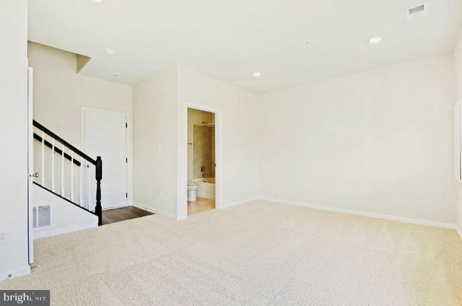 325 Ensemble Way Frederick, MD 21701 - Photo 9 of 13 Spacious, light-filled living area.
