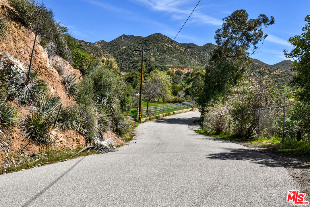 2447 Stonyvale Road Tujunga, CA 91042 - Photo 29 of 33 a view of a road with a yard