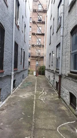 a view of a street with buildings