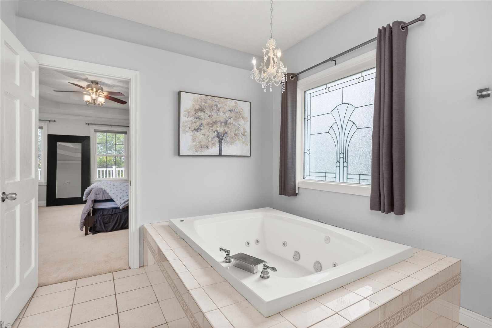1 Arc Wenona, IL 61377 - Photo 29 of 52 a bath tub sitting in a bathroom next to a window