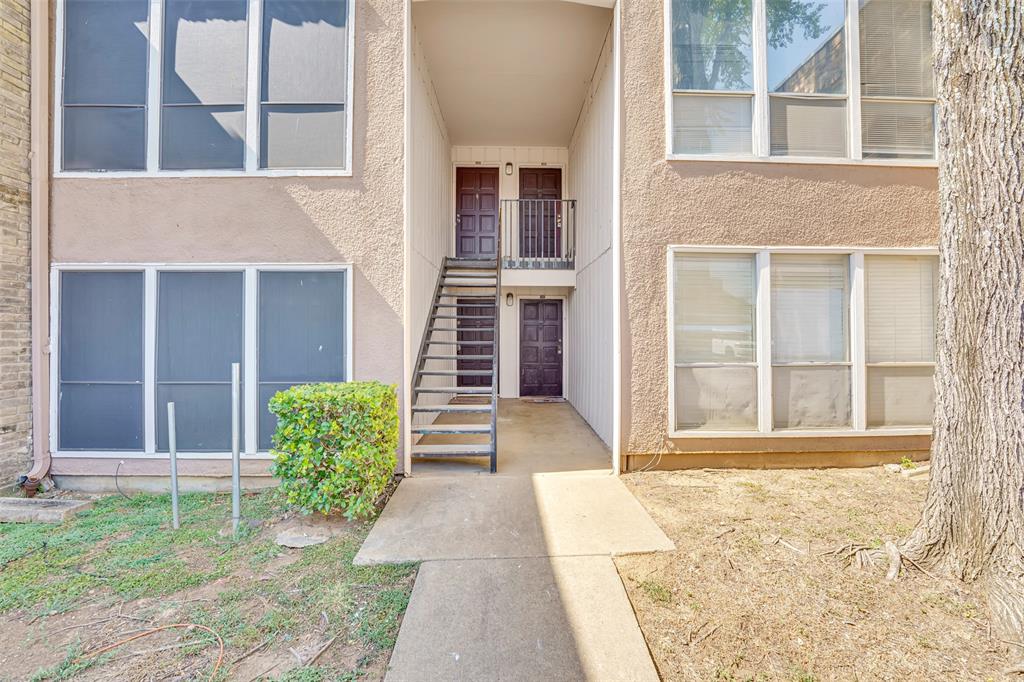5604 Boca Raton Boulevard, Unit 248 Fort Worth, TX 76112 - Photo 1 of 1 front view of a brick house with a large window