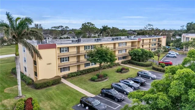 an aerial view of a house with outdoor space