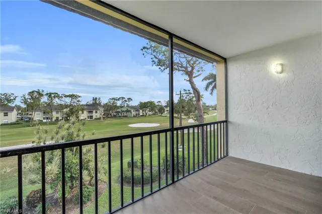 a view of balcony with furniture
