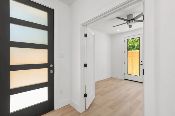 a view of an empty room with a window