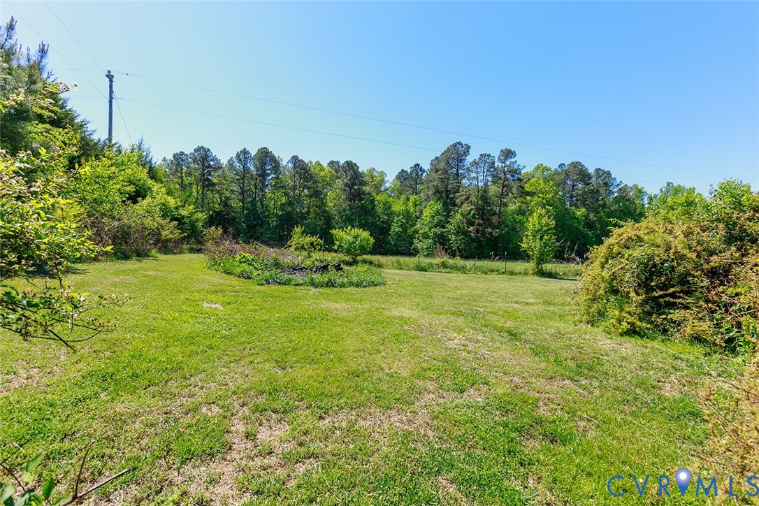9903 Boze Road Ford, VA 23850 - Photo 31 of 45 a view of a grassy area with an trees