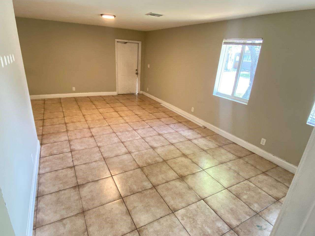 141 Northwest 10th Street Pompano Beach, FL 33060 - Photo 21 of 24 a view of an empty room and window