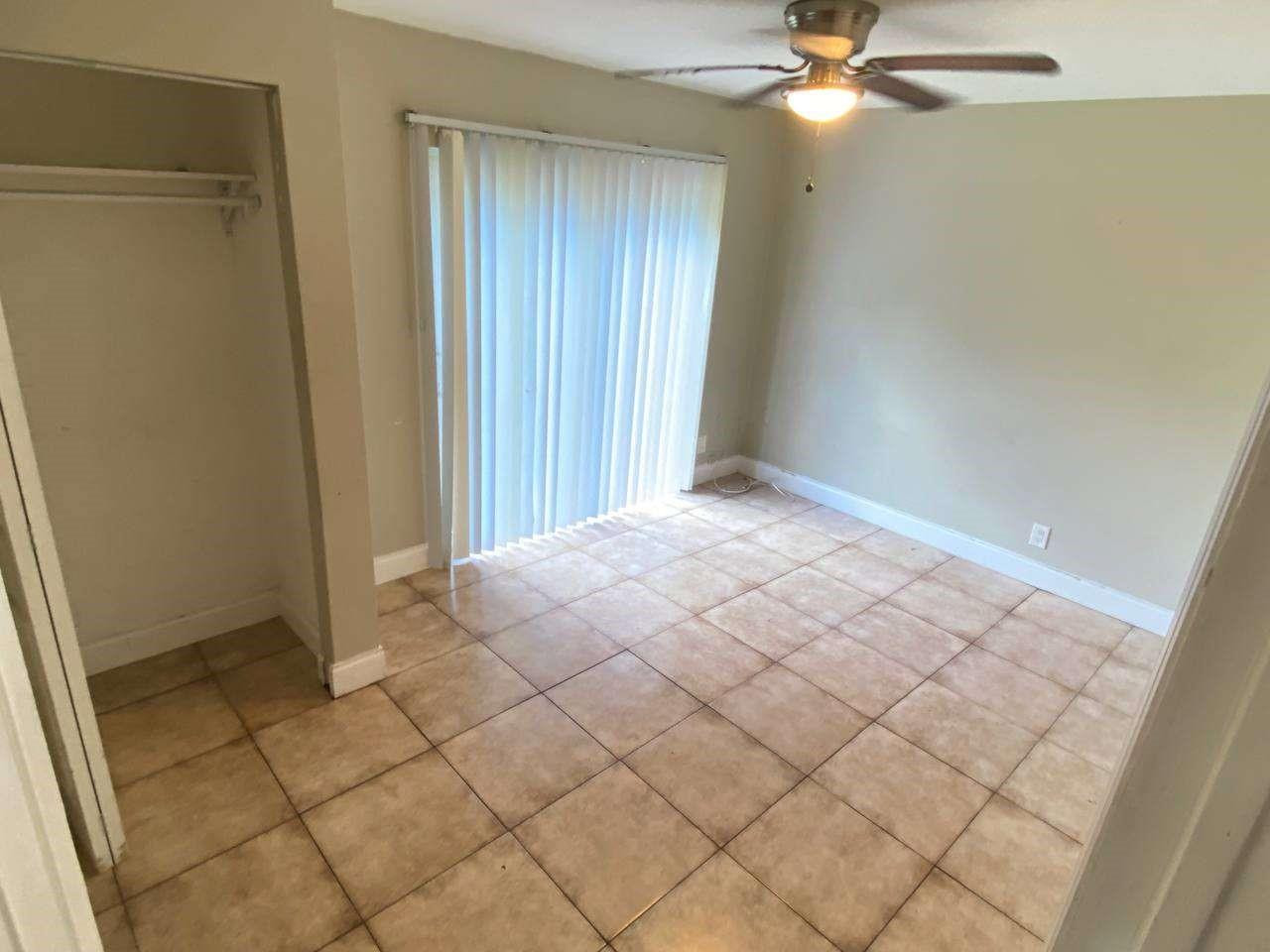 141 Northwest 10th Street Pompano Beach, FL 33060 - Photo 23 of 24 a view of an empty room and window